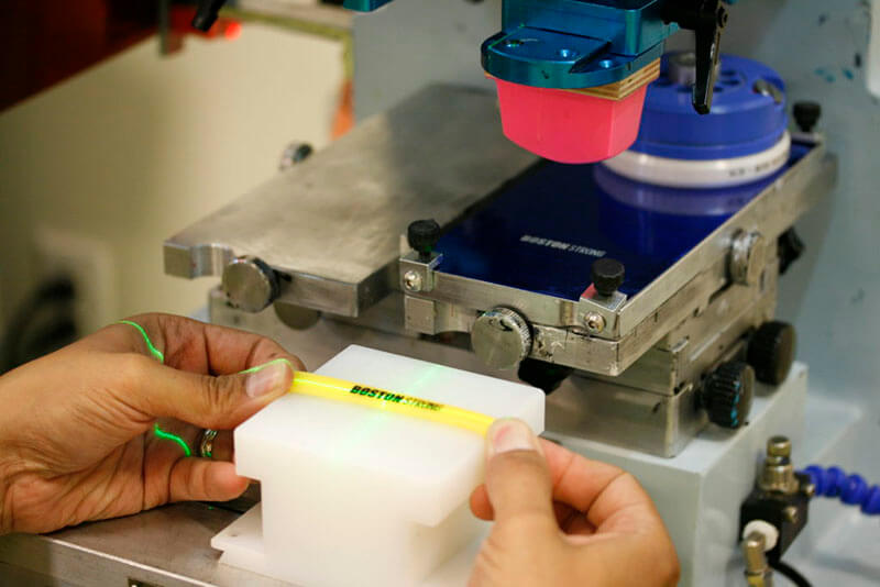 Pad printing logo on silicone wristband using automated machine